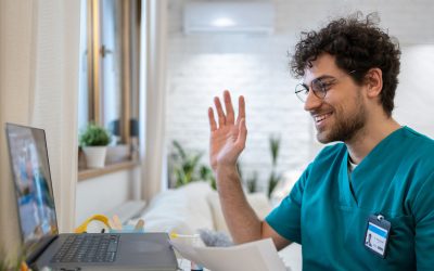 a man holding a laptop