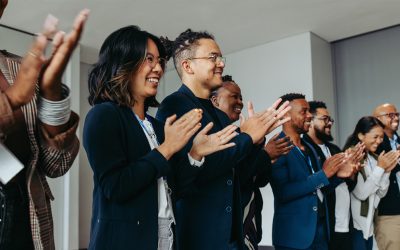 a group of people standing in a room
