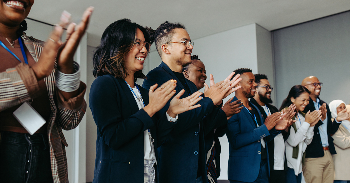 a group of people standing in a room