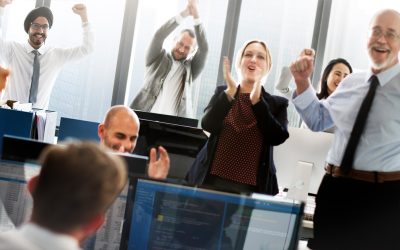a group of people standing in a room