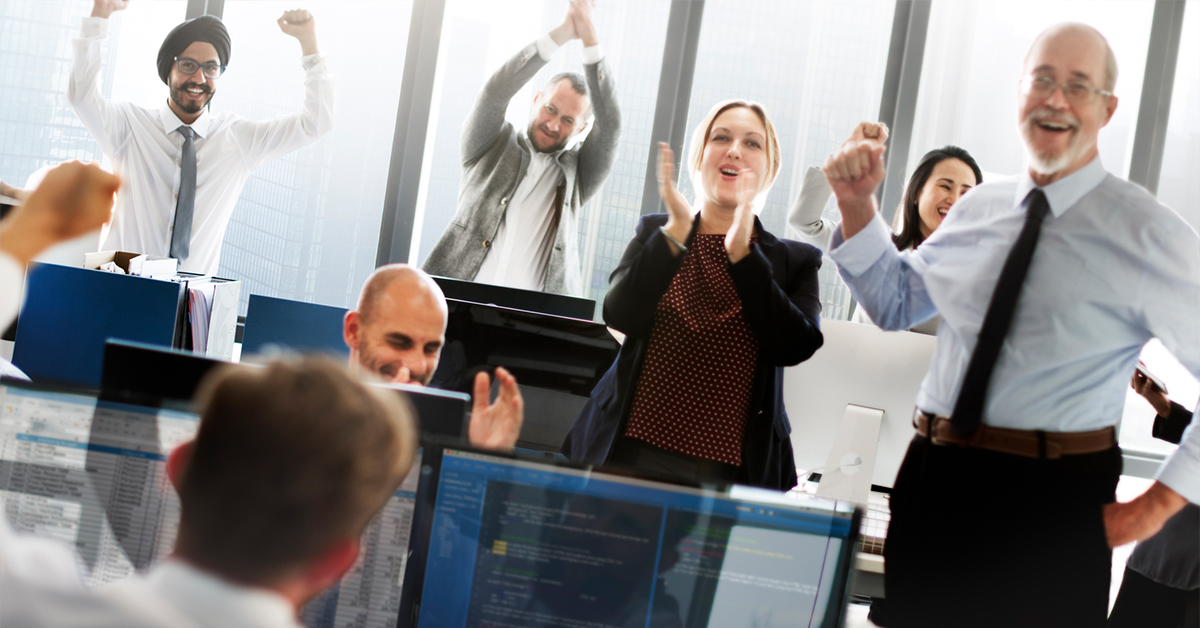 a group of people standing in a room