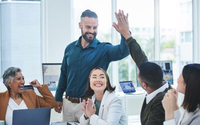 Rachel Tang et al. standing in front of a window