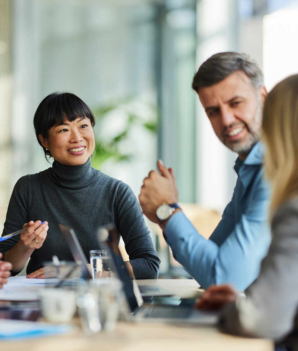 a group of people around a table