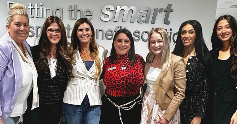 a group of people posing for a photo