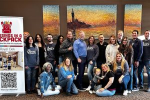 a group of people posing for a photo