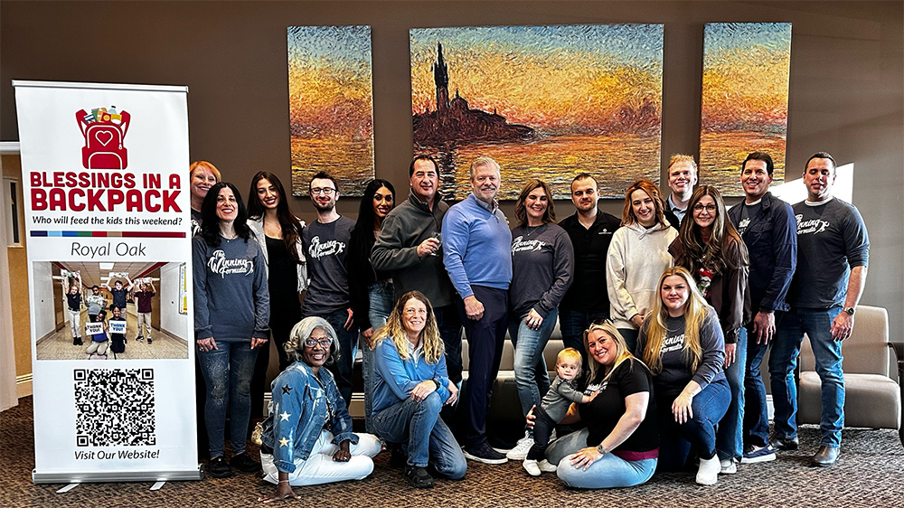 a group of people posing for a photo